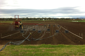 broccoli field and GHG chambers being sprayed